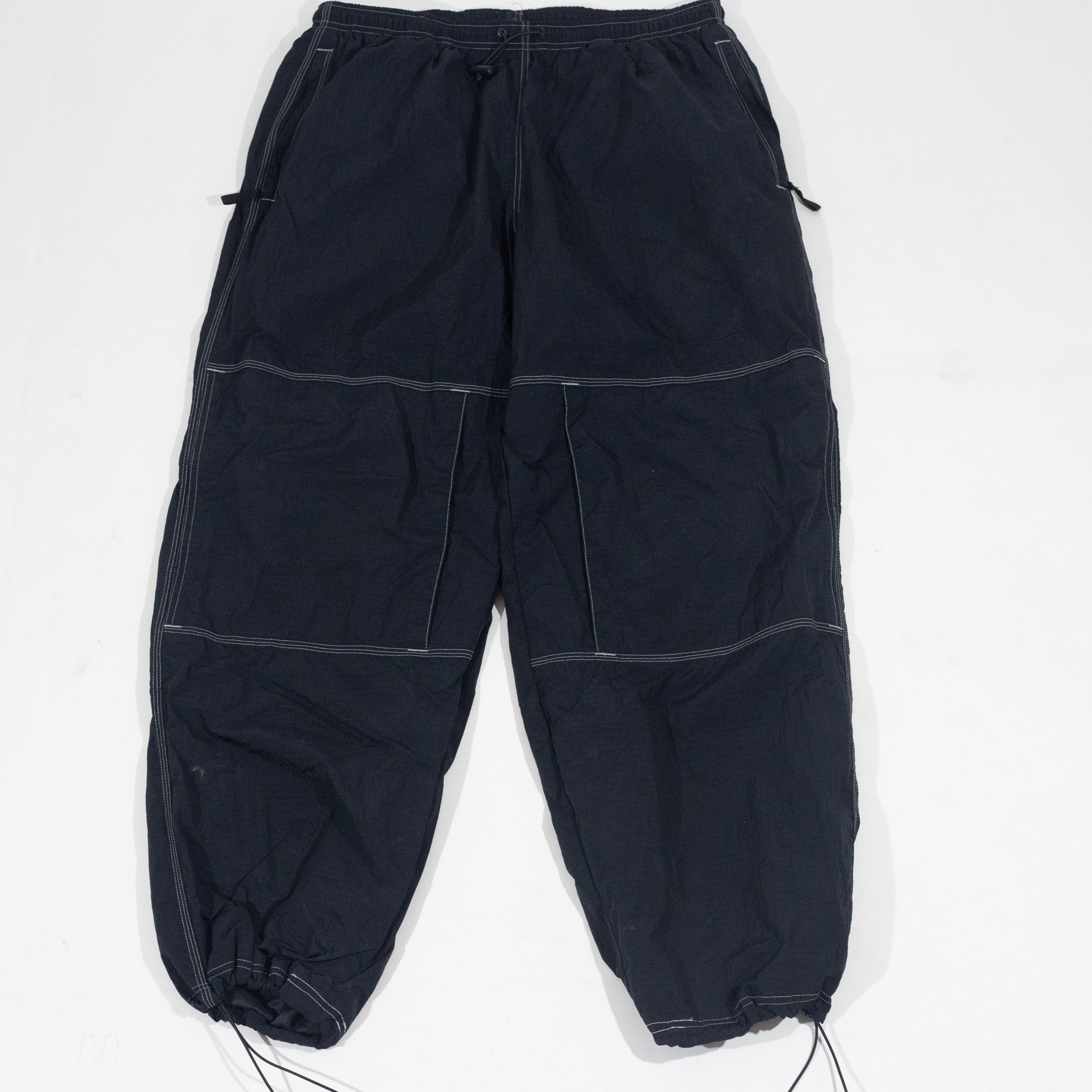 Calça Nike x Supreme Refletivo (USADO)